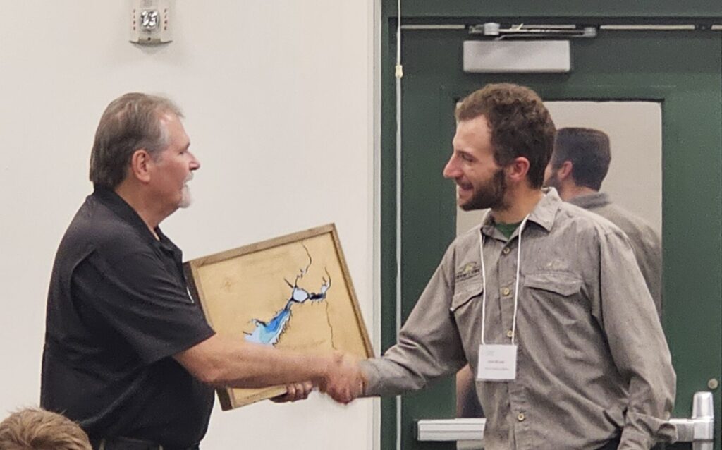Dr. Jack McLaren accepts the 2025 Friends of Reservoirs Award on behalf of the Henrys Fork Foundation, who have accomplished great fish habitat work at Island Park Reservoir, Idaho.